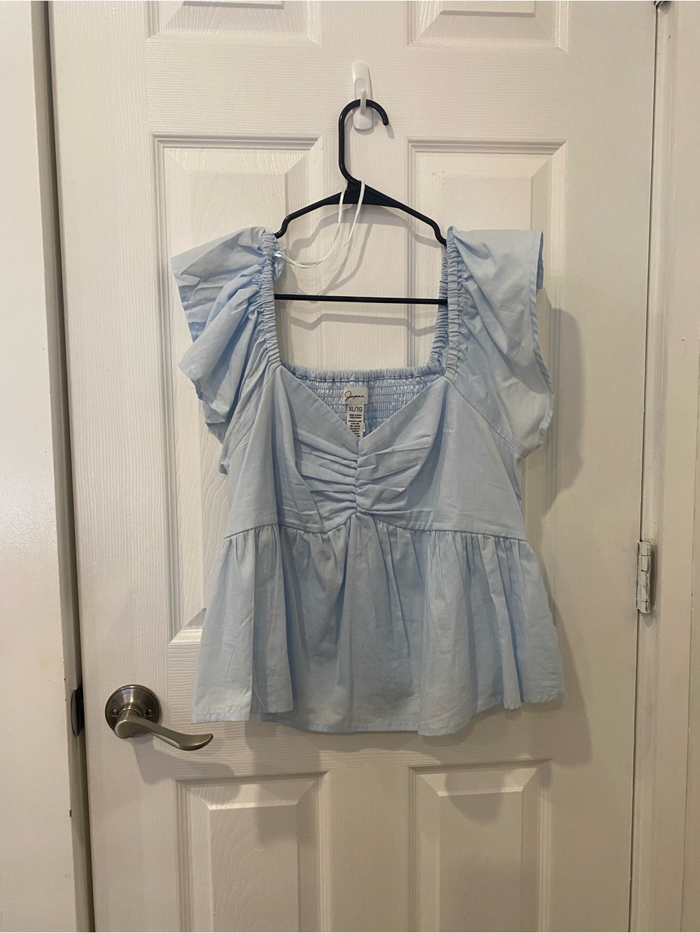 Light Blue Ruffled Peplum Top - Women's